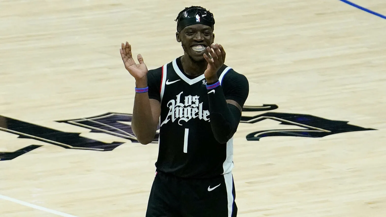 Nuggets trade Reggie Jackson and three draft picks to Hornets for cash Image