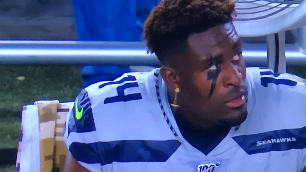 DK Metcalf sets NFL record for most receiving yards for a player in his first playoff game Image