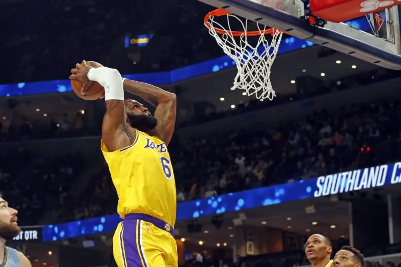 LeBron James sets NBA record for most games played Image