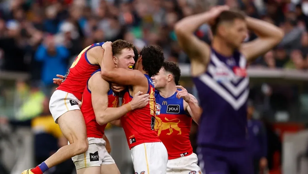 AFL: Lions Steal Three-Peat With Late Four-Goal Burst as Bolton Wins Norm Smith in Defeat Image